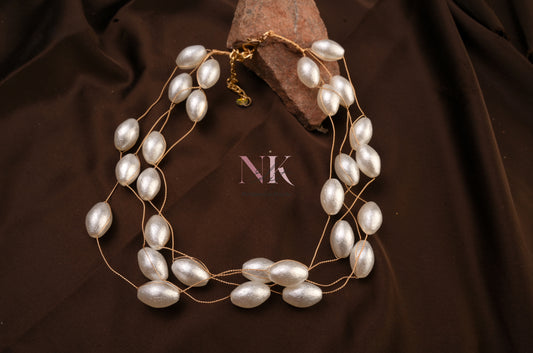 Lustrous Elegance Multi-Layer Pearl Neckline