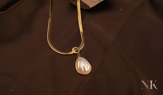 Lustrous Teardrop Pearl Pendant Neckline