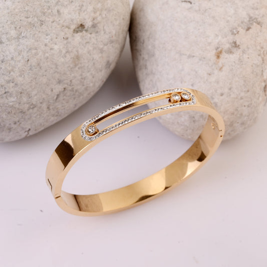 Hollow Cut Moveable Crystal Gold Bracelet