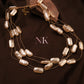 Lustrous Pearl Cascade Neckline