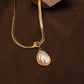 Lustrous Teardrop Pearl Pendant Neckline