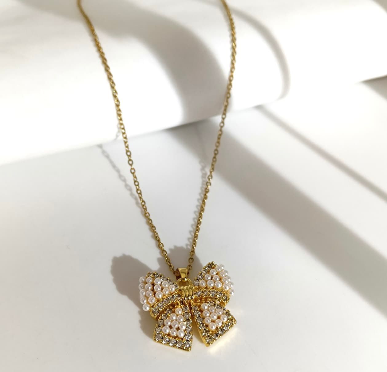 Pearl Bow Elegance Neckline